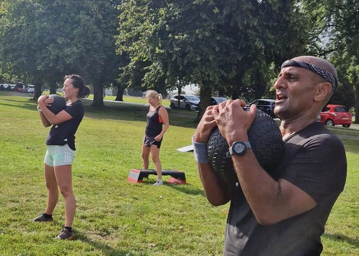 Photo of slamball squat exercise